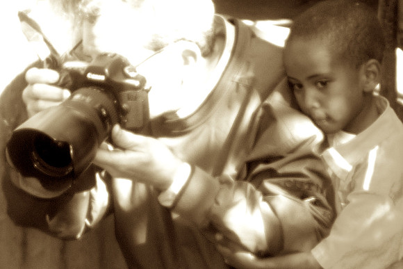 "My dear friend" ... Jim and boy at HIV patient scene