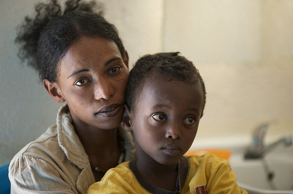 EHN beneficiaries Tomas, age six, and mother Zenbech.  Follow-up to treatment for typhus.