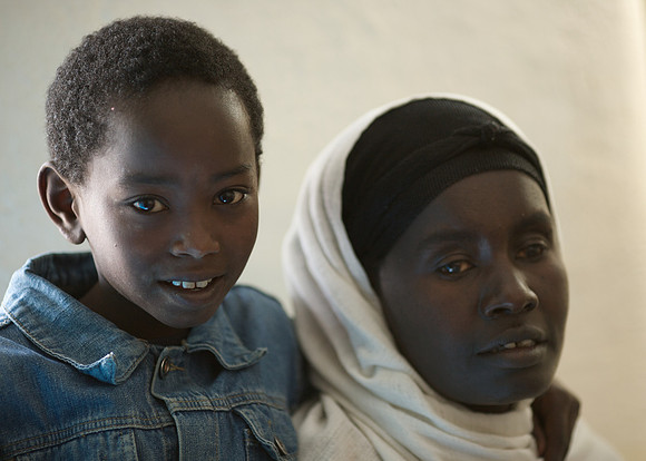 Melaku's mother Birke has been blind for 8 years.  She and her son subsist by begging near St. Uriel Church baptismal spring.